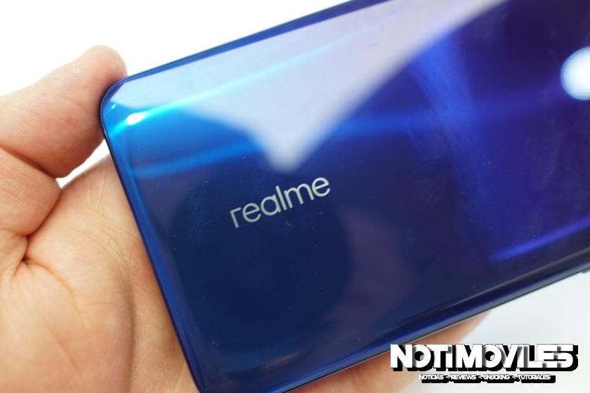 Realme-X-Launch-Event-Logo-on-phone-840x560.jpg