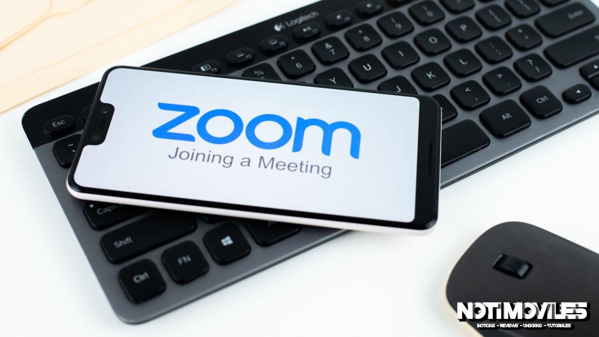 Zoom-Meetings-on-smartphone-next-to-office-equipment-stock-4-1200x675.jpg